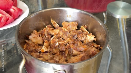 A classic homemade pork ear dish served with fresh sliced tomatoes combines rich flavor with rustic tradition. A hearty appetizer for casual meals, gatherings and home cooking.