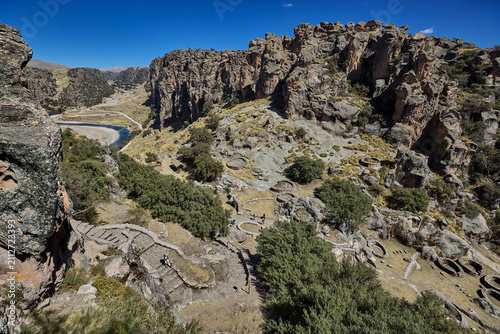 T'aqrachullo rises like a forgotten city carved into stone. Spread across seventeen hectares of windswept mesa in Espinar, Cusco, this ancient citadel holds nearly six hundred structures shaped by War