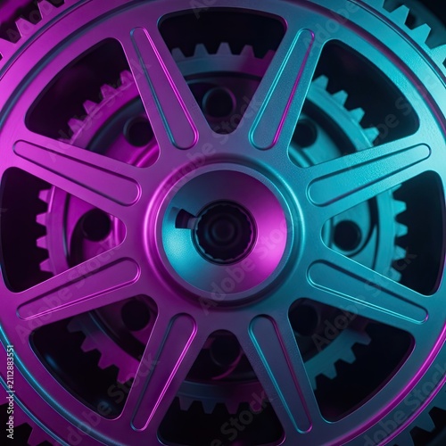 Close up of mechanical gear in neon lighting.