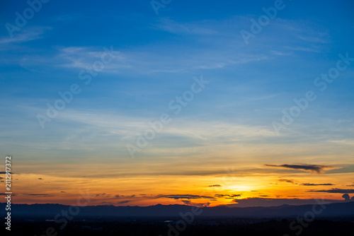 colorful dramatic sky with cloud at sunset