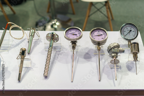 Industrial temperature and pressure gauges on display