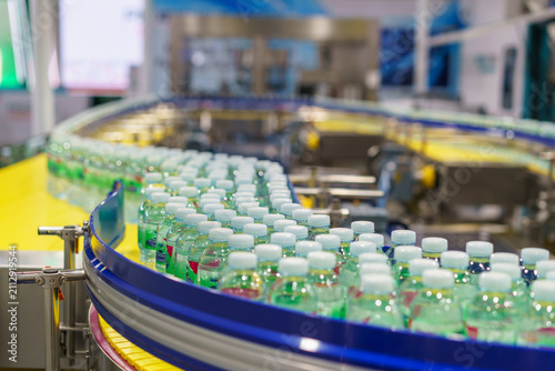 Bottled Drinking Water on Automated Production Line Conveyor