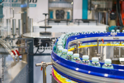 Bottled Drinking Water on Automated Production Line Conveyor