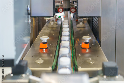 Empty Plastic Bottles on Production Line Conveyor