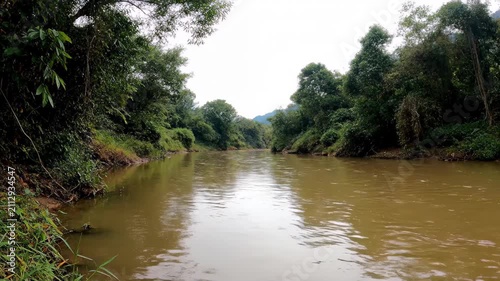 Natural rivers and green plant landscapes on both sides, natural scenery along the river