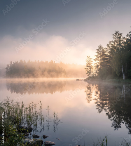 Serene Misty Lake Landscape at Sunrise