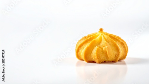 Delicate Golden Choux Pastry Shell Capturing the Essence of Sweet Baking on a Pristine White Surface