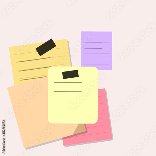 Colorful adhesive paper notes organized on a neutral background with reminder stationery organizer planning