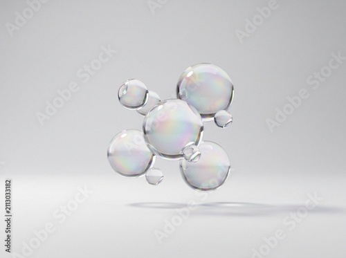 Floating iridescent glass spheres cluster with refractive light effects on white