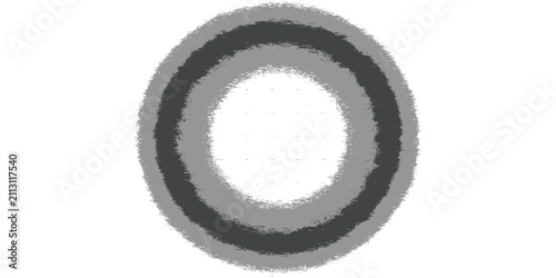 Circular abstract grunge design. A circular grunge texture with layers of distressed effects. An abstract explosion background featuring a rough texture effect.