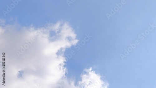 Blue Sky with Bright White Clouds Background