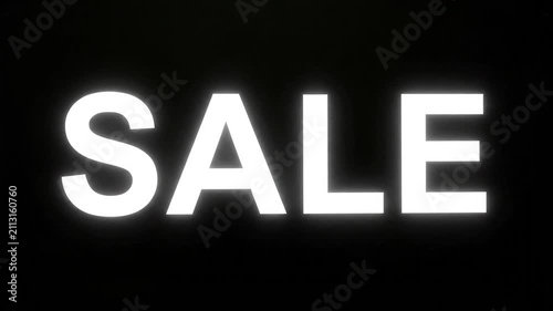 Bold white letters spell out the word sale on black