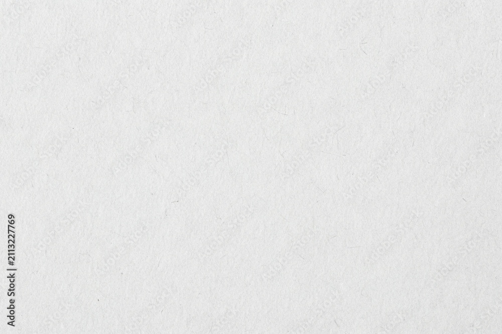 Fototapeta premium White recycled paper texture with rough grain surface, blank cardboard background for stationery, packaging, printing, branding, mockups and creative design.
