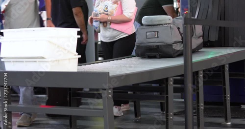 Checking luggage and passengers before entering the train station. Safety and security
