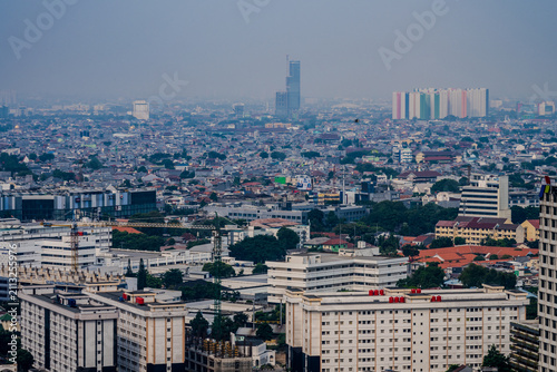 Quadro su tela Cityscape of Central Jakarta with dense urban development