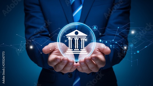 Banking and financial services concept with digital bank icon in businessman hands