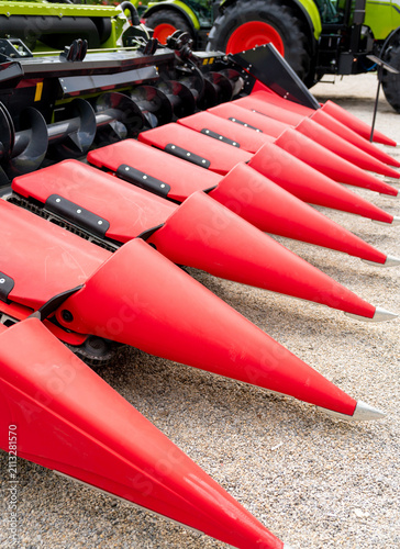 Close-up of combine harvester corn header.