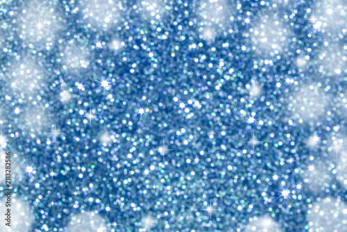 Soft blue glitter bokeh background with sparkling light and festive shimmer for design