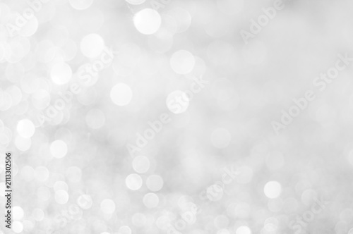 Obraz na plátne Light reflections create bright spots on a white background