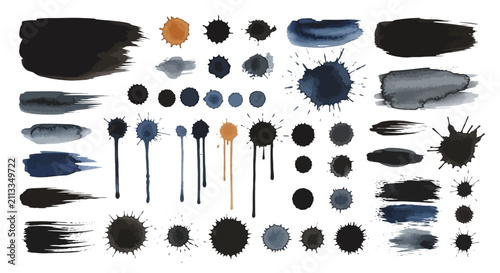 A collection of various dark watercolor paint splatters and strokes