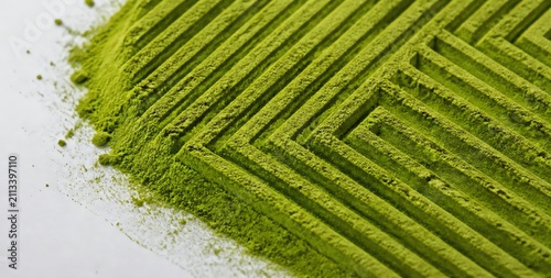 Green Matcha Powder Artfully Arranged in Linear Patterns for Culinary and Artistic Uses