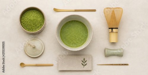 Matcha Tea Preparation with Traditional Utensils and Green Tea Powder