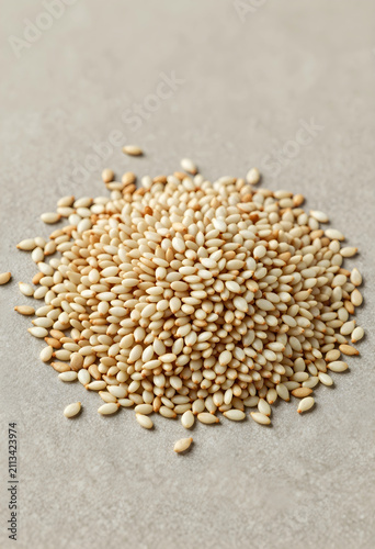 Pile of sesame seeds on tex...