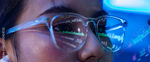 Obraz na plátně Woman glasses code reflection technology face eye screen blue programmer woman w