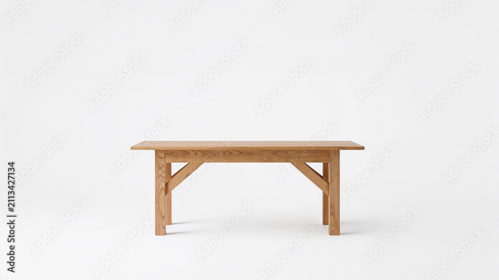 Fototapeta premium A wooden table with a simple design on a plain white background.