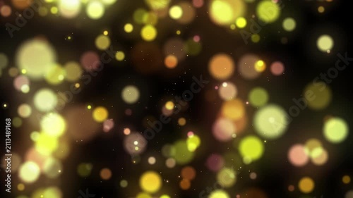 Vibrant Golden Yellow Bokeh Particle Dust Motion 4K Video