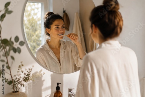 Brushing teeth in natural morning light
