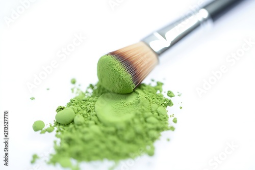 Green eyeshadow powder with makeup brush