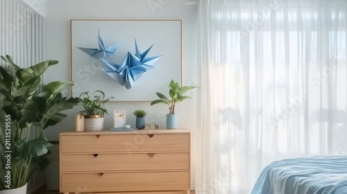 Modern bedroom with wooden dresser and origami art