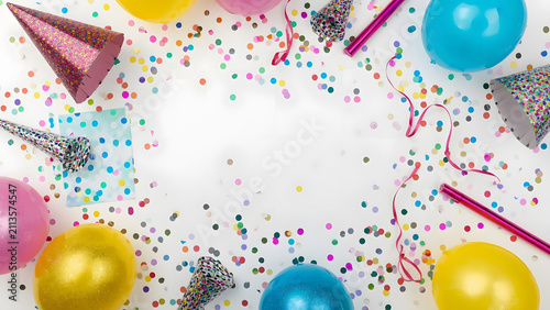 Birthday Party Flat Lay: Balloons, Confetti, Party Hats, and Streamers on White Background