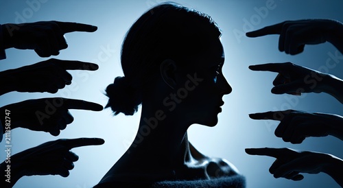 Silhouette of woman's profile surrounded by accusing fingers pointing at her