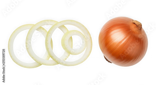 Fresh whole brown onion and sliced onion rings for healthy cooking