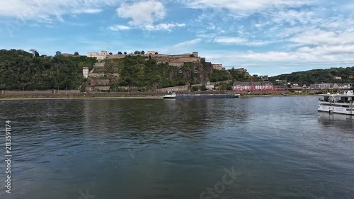 Historic Ehrenbreitstein Fortress and Rhine River traffic in Koblenz captured on a bright summer day