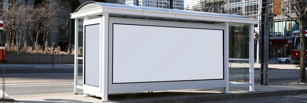 Obraz premium Blank Toronto bus shelter advertising display mockup. Blank white billboard poster display provides copy space at a downtown bus stop