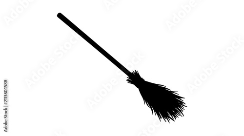 Fotografie Broom silhouette is presented as a simple black graphic on a stark white background, angled diagonally to suggest movement