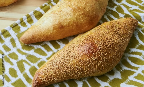Samoon bread loaves with sesame topping in iraqi cuisine.
