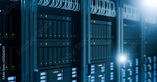 3D Illustration of Modern Data Center Server Racks with Glowing Green LED Lights in Blue Dark Room