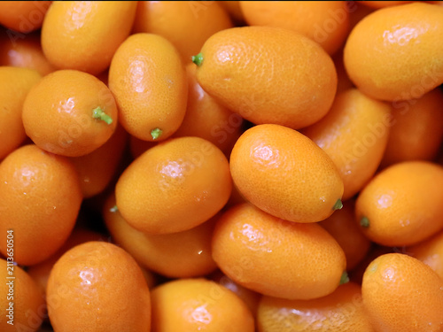 Obraz na plátně Full Frame Background of Fresh Ripe Kumquats Citrus Fruits