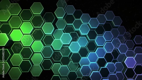 Hexagonal pattern of green and blue spheres in motion