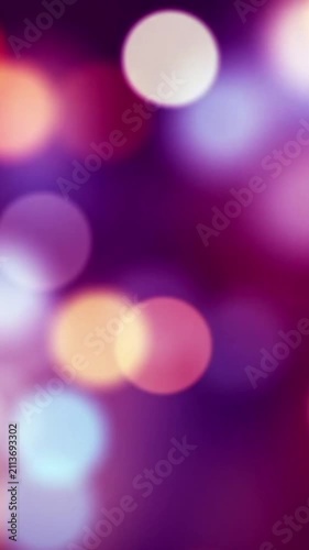 Bokeh Light Blur Soft Background and Glowing Colorful Night Circles Vertical Abstract .