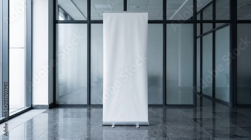 Blank roll up banner mockup in modern corporate office interior