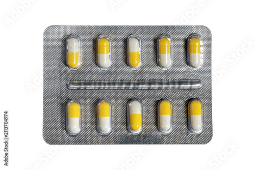 Pharmaceutical blister pack with yellow white capsules in sealed foil