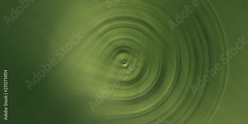 Dark olive green radial swirl background with soft circular ripple effect.