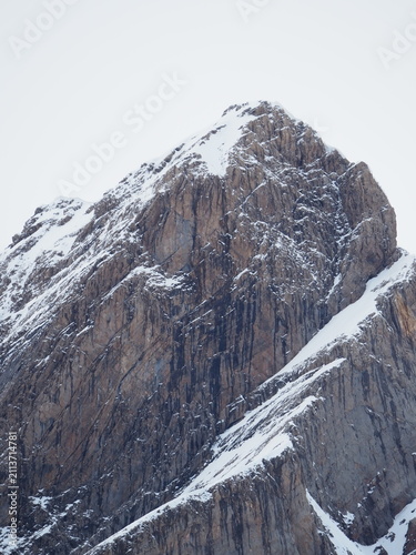 Snow-covered rocky mountain peak in Pineta Valley, Ordesa y Monte Perdido National Park, Spanish Pyrenees.