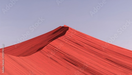 Red Rock Formation With Smooth Lines Under Clear Sky