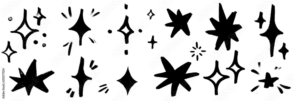 Naklejka premium Crayon and chalk star doodles drawn by hand across soft paper. Pencil figures, asterisks and a second crayon star bring a warm hand drawn energy to every figure.